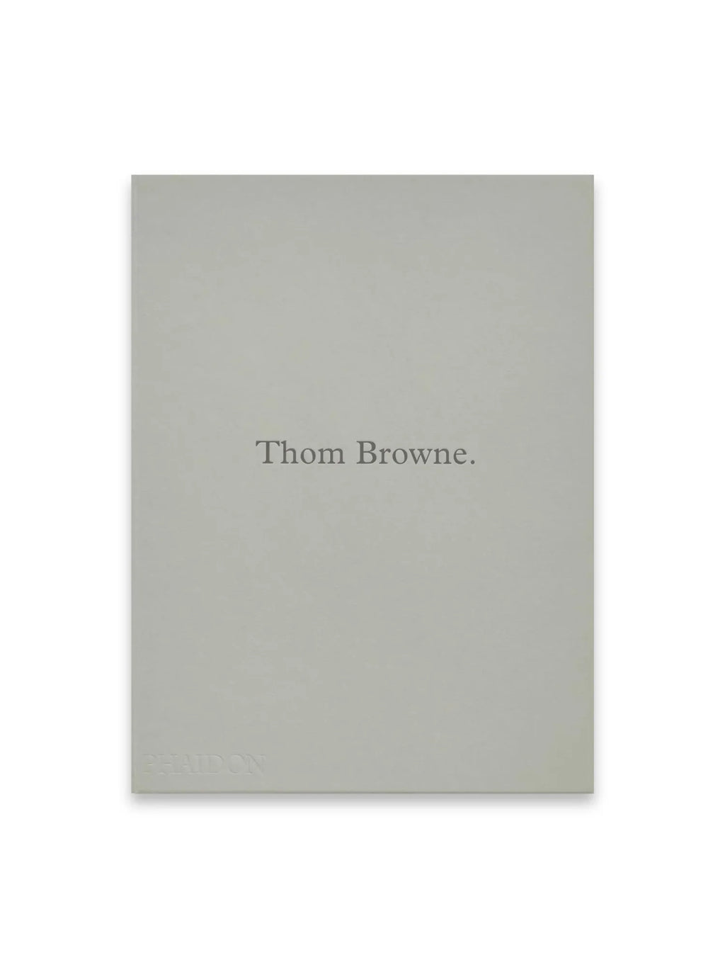 Book Thom Browne, a minimalist modern art book with a matte light gray cover and subtly embossed "Thom Browne." title in the center, and "PHAIDON" publisher name at the bottom left. This stylish coffee table book is perfect for fashion enthusiasts and art collectors seeking sophisticated design inspiration.