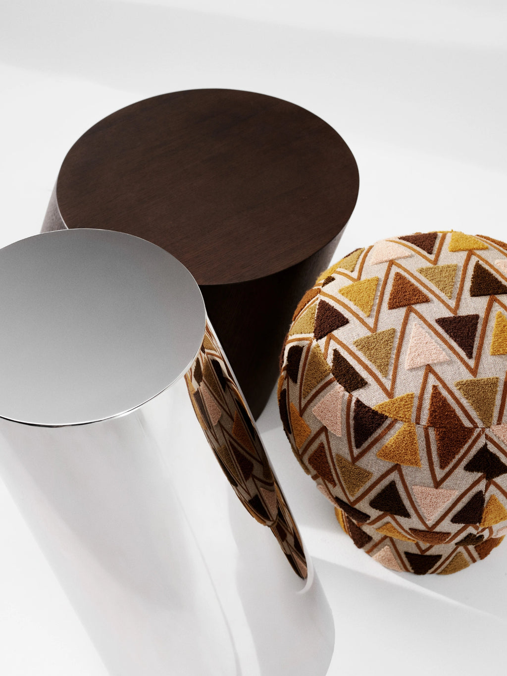 NORR11 Tilt Side Table, a modern minimalist cylindrical side table crafted from rich dark brown wood with a smooth finish and clean, contemporary lines. This versatile round accent table is perfect for Scandinavian living rooms or as a sleek bedroom nightstand in organic modern interiors.