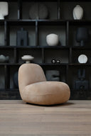 Sleek and sophisticated flat toe lounge chair in white upholstery