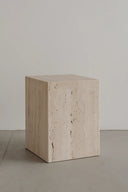Close-up of Coi Travertine Pillar showcasing its natural textures and patterns