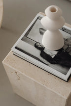 Close-up of Coi Travertine Pillar revealing intricate patterns and details