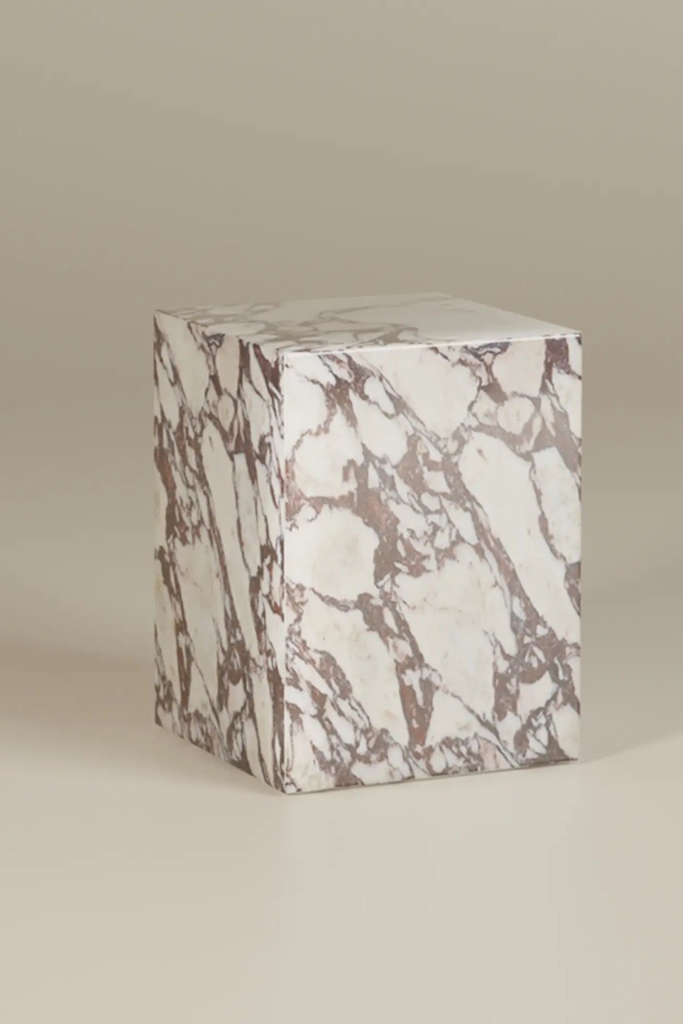 Coi Marble Pillar with intricate white veining and smooth finish