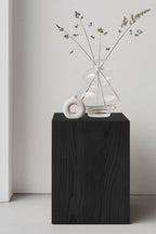 Close-up of intricate wood grain detailing on Coi Wood Pillar