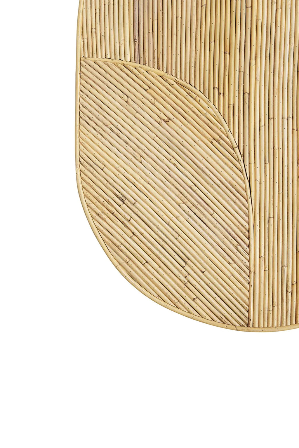 Tine K Viva Rattan Table, a natural rattan coffee table featuring a warm light beige finish and a distinctive organic leaf-like pattern formed by meticulously arranged rattan poles.