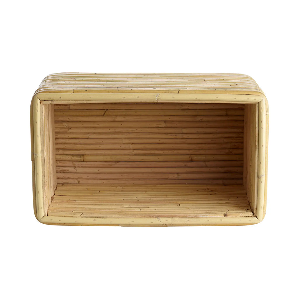 Tine K Viva Rattan Shelf, a natural bamboo wall shelf with a rectangular open cubby design and softly rounded corners, featuring a distinctive textured finish from horizontally stacked individual bamboo poles in warm, light wood tones. This versatile storage shelf is perfect for boho living rooms, organic modern bedrooms, or coastal-inspired shelf styling.