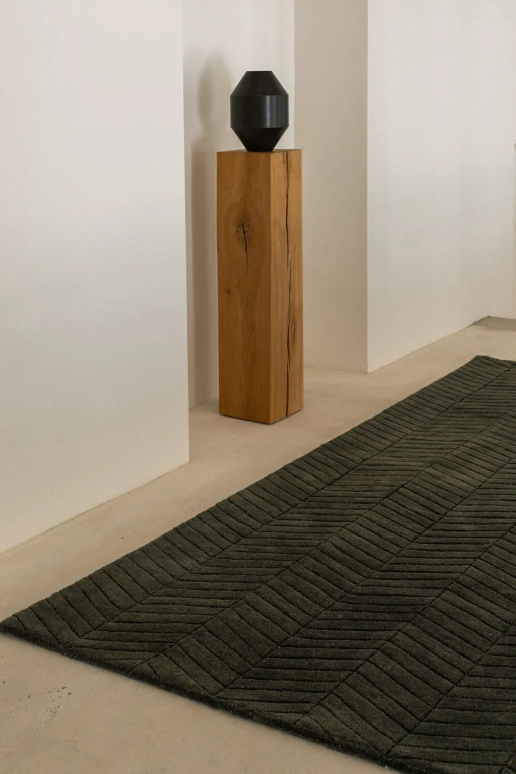 Beautifully handwoven beige and cream surface rug with intricate geometric patterns