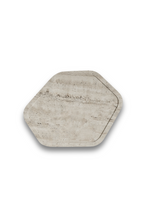 Hexagonal stone coaster by Formarkivet on a white background