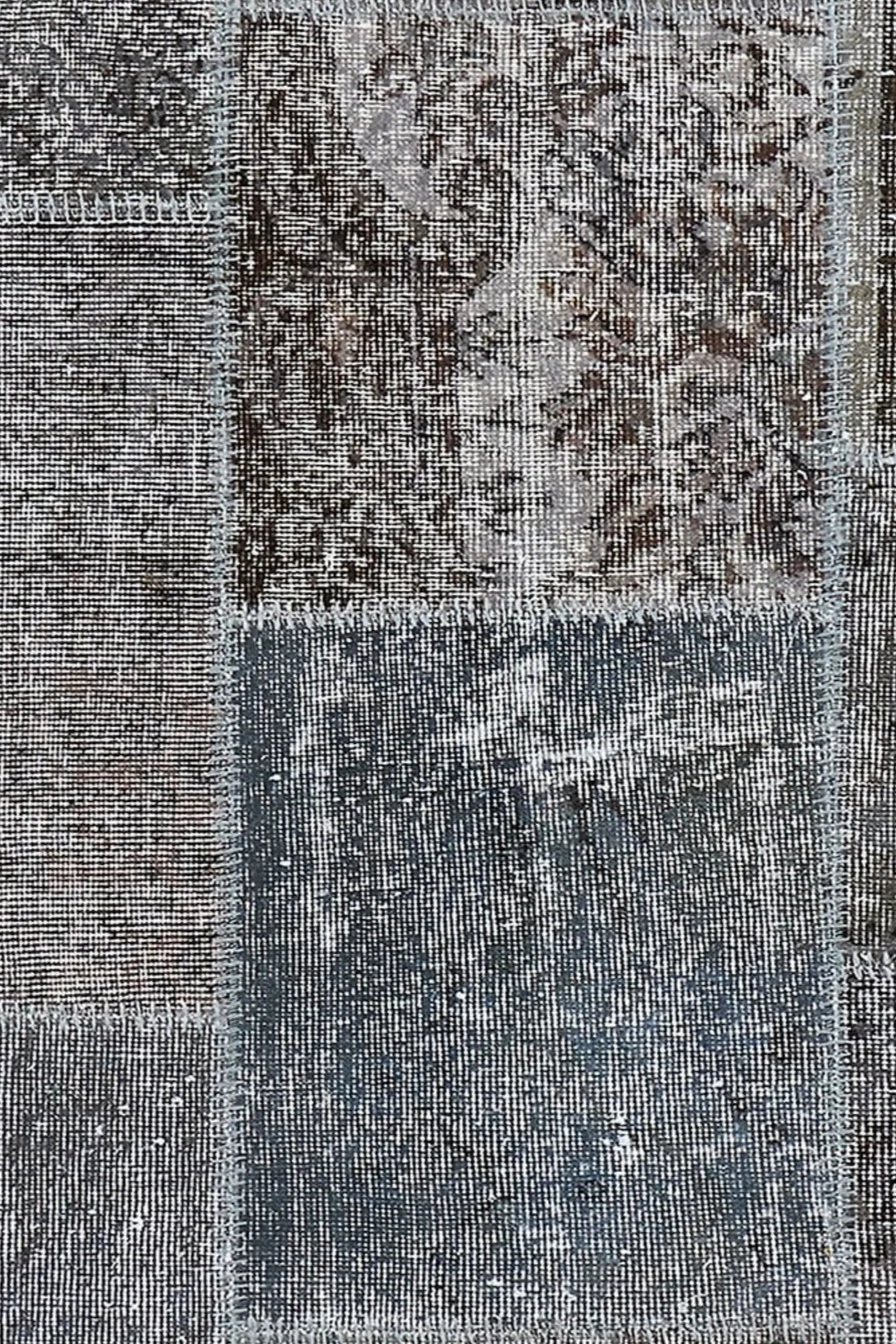 Traditional handwoven tapestry with faded, time-worn appearance