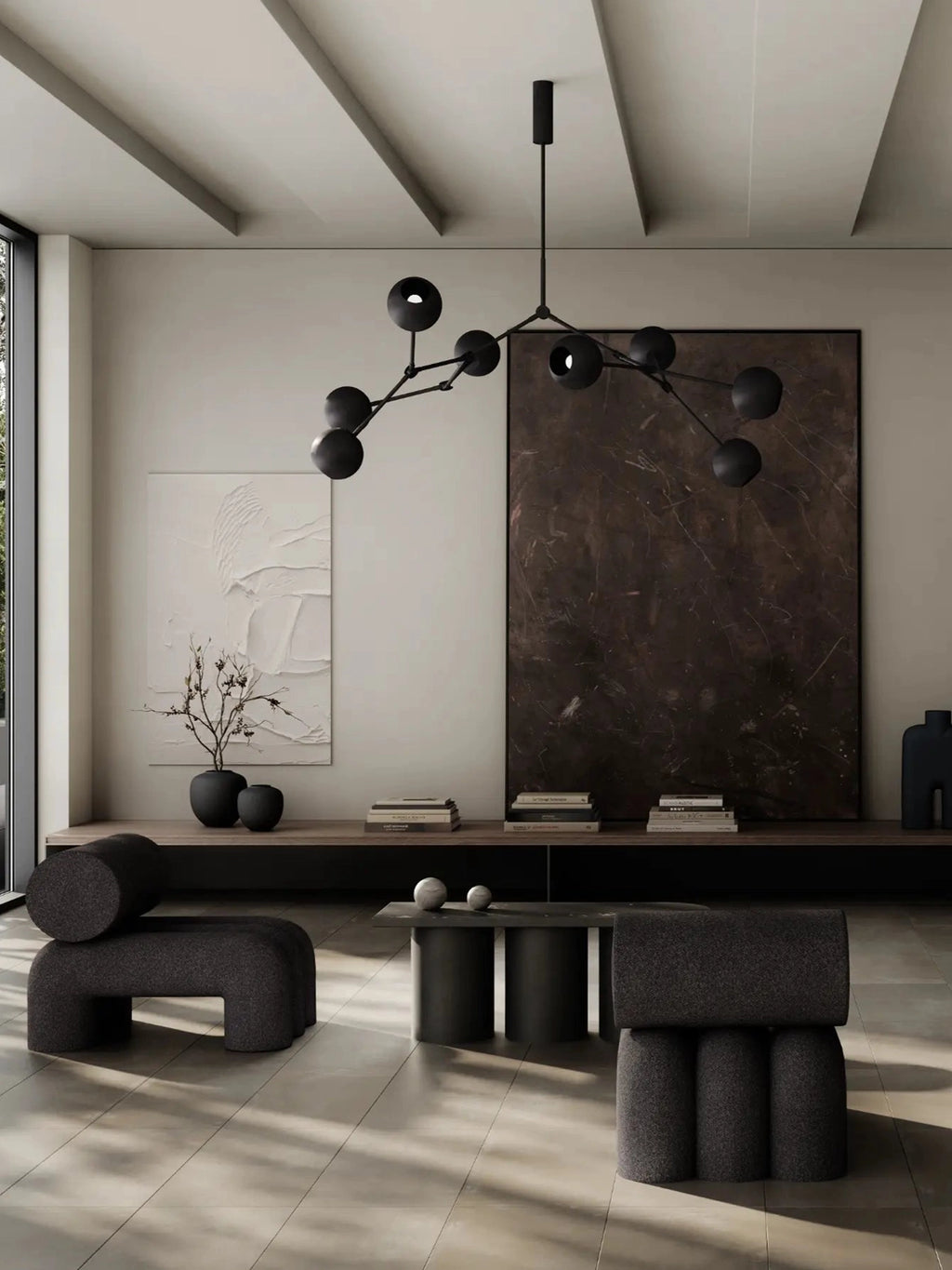 101 CPH Foku Lounge Chair in dark charcoal bouclé fabric. This luxury modular seating features a unique curved, sculptural design within a modern living room setting. Ideal for contemporary interior design.