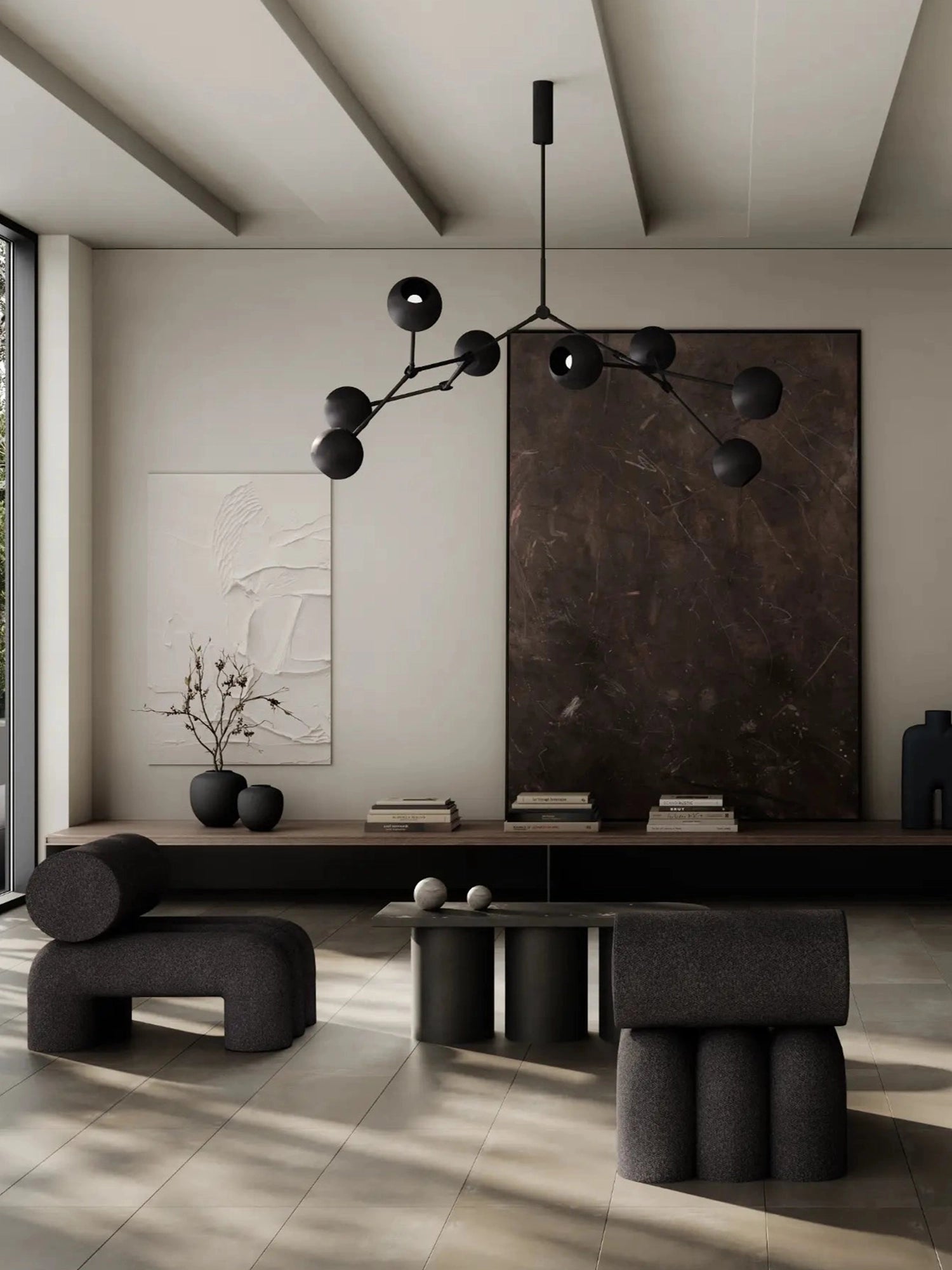 101 CPH Foku Lounge Chair in dark charcoal bouclé fabric. This luxury modular seating features a unique curved, sculptural design within a modern living room setting. Ideal for contemporary interior design.