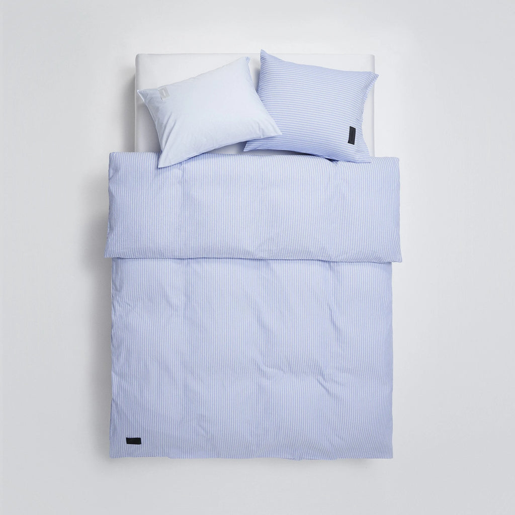 Magniberg Wall Street Duvet Cover - Stripe Light Blue Oxford, a crisp light blue and white striped oxford cotton duvet cover featuring fine vertical pinstripes and a soft, breathable texture, complete.