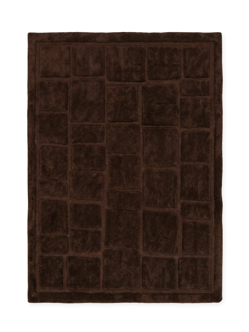 Tinted Objects Wandel Wool Rug, a rectangular dark brown premium wool rug with a plush, textured surface and an embossed grid pattern of varying square and rectangular shapes. This luxurious and soft rug is perfect for adding warmth and a modern touch to any living room or bedroom.