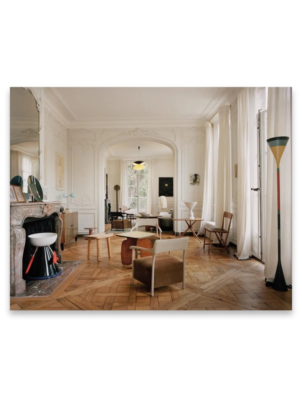 Book World’s Finest Apartments, featuring a spacious, elegant Parisian apartment with ornate white moldings, herringbone parquet flooring, and modern designer furniture. This interior design book is perfect for architecture enthusiasts and interior design professionals seeking inspiration.