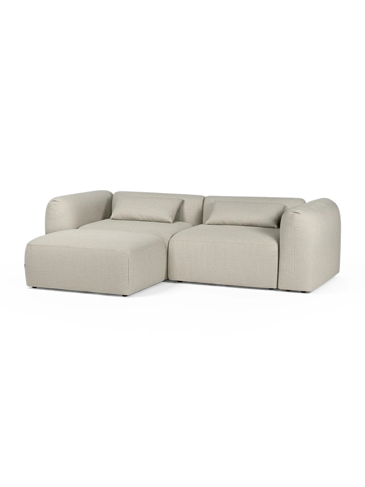 Beige sectional sofa on a white background