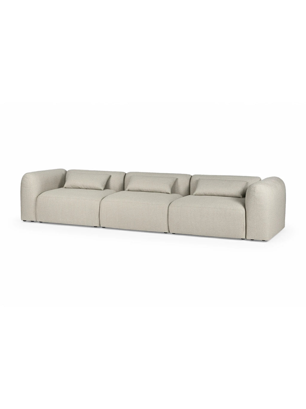 noo.ma Yaro Sofa, a contemporary modular sofa upholstered in a natural beige bouclé fabric with a soft, textured weave. This low-profile design features rounded, organic shapes, deep seating, and clean, minimalist lines, complemented by three matching back cushions. Ideal for creating a cozy, Scandinavian-inspired living room or a spacious organic modern lounge area.