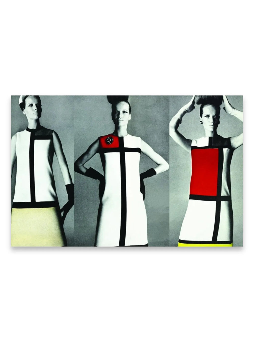 Book Yves Saint Laurent Accessories Book, featuring three models in iconic Mondrian-inspired dresses with black, white, red, and yellow color blocks on a gray background. This fashion history book is a must-have for style enthusiasts and collectors of designer fashion literature.