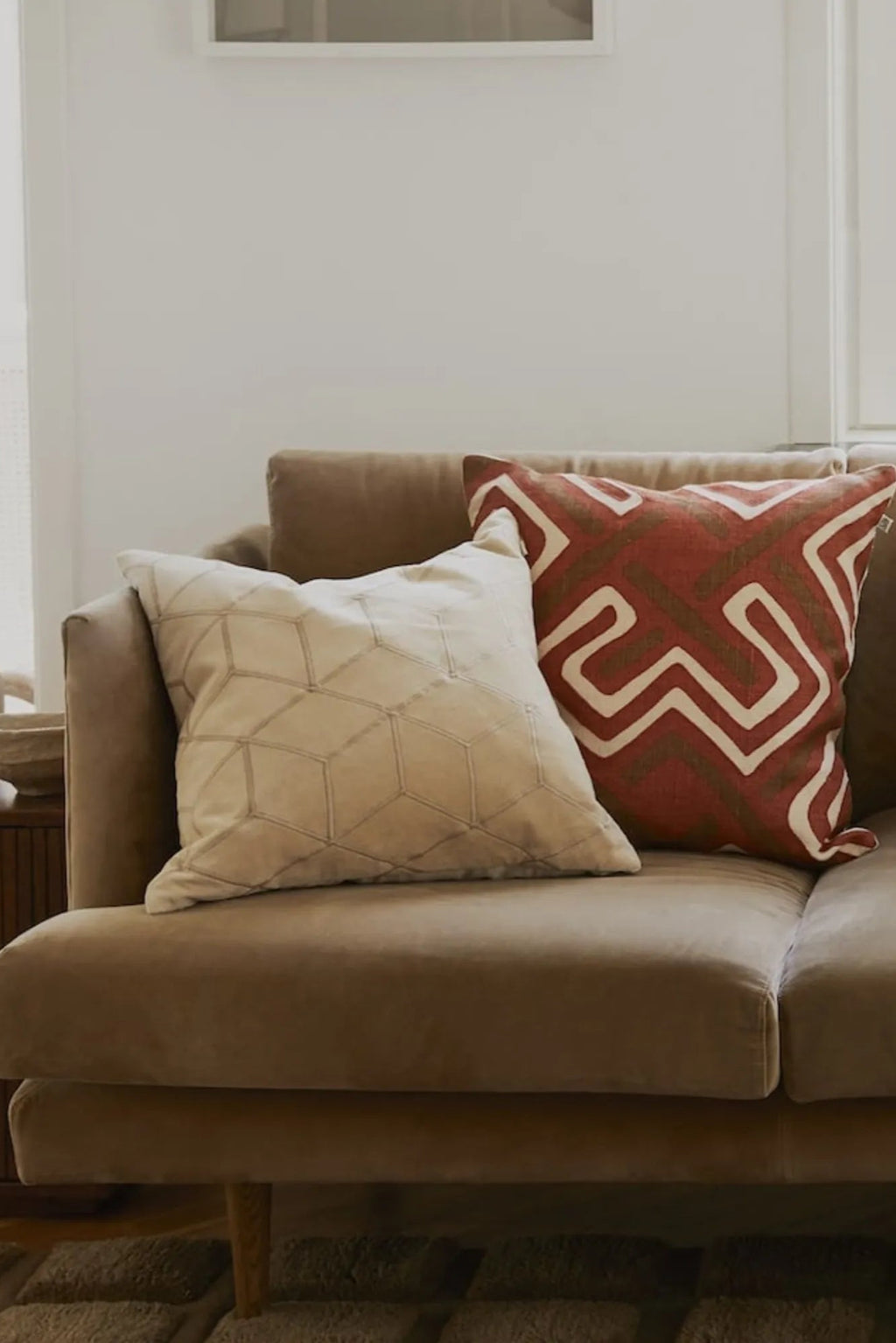 Chhatwal & Jonsson Vir Velvet Throw Pillow, a soft beige velvet cushion featuring a subtle stitched geometric hexagonal pattern, offering a plush texture and modern minimalist design.