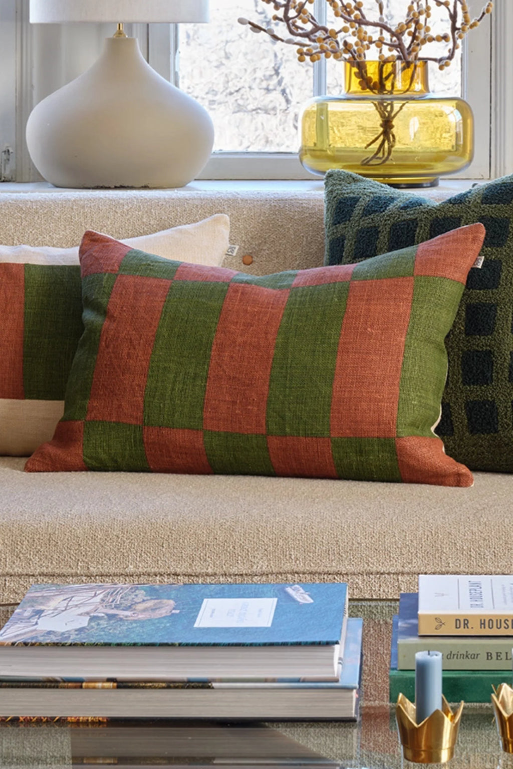 Chhatwal & Jonsson Samar Linen Throw Pillow, a rectangular decorative cushion crafted from natural woven linen, featuring a bold large-scale checkered pattern in earthy olive green and warm terracotta orange hues. This rustic yet contemporary linen pillow is ideal for adding inviting texture and color to a living room sofa, bed, or cozy bohemian-inspired space.