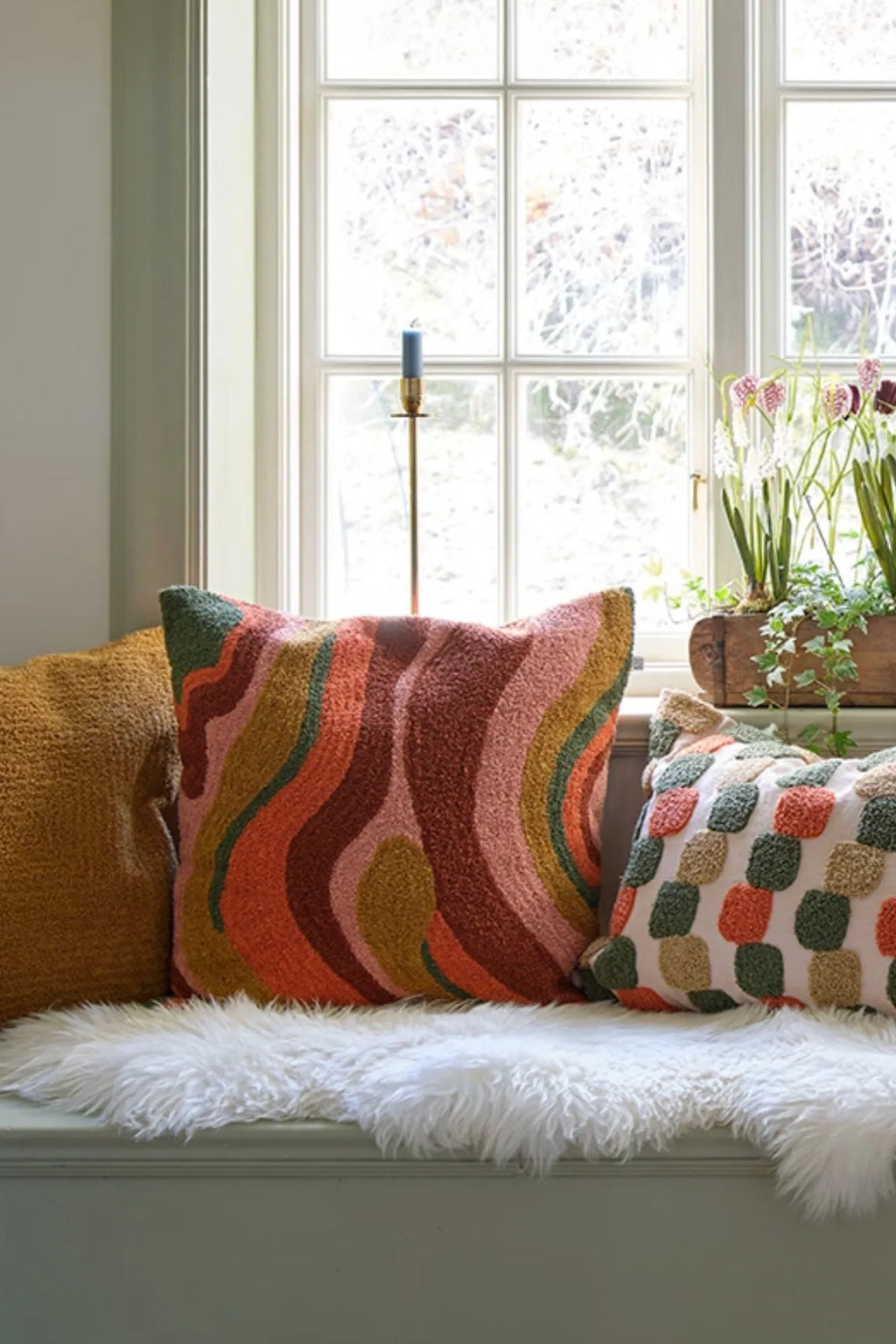 Soft and cozy Boucle cushion pillow in apricot orange and rose colors