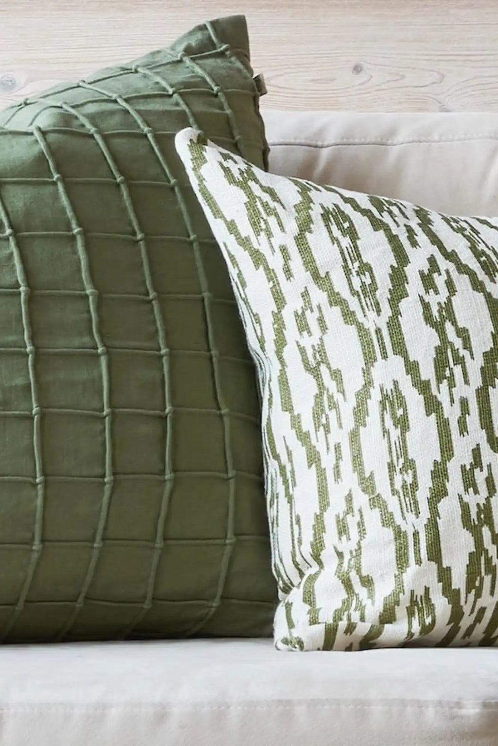 Chhatwal & Jonsson Deccan Linen Throw Pillow, a rich olive green linen cushion featuring a distinctive tufted grid pattern that creates a plush, textured surface.