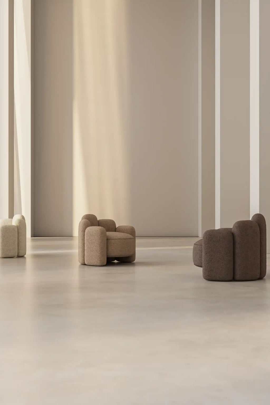 Modern Agnes Armchair in grey linen with sleek, angled legs and wide seat