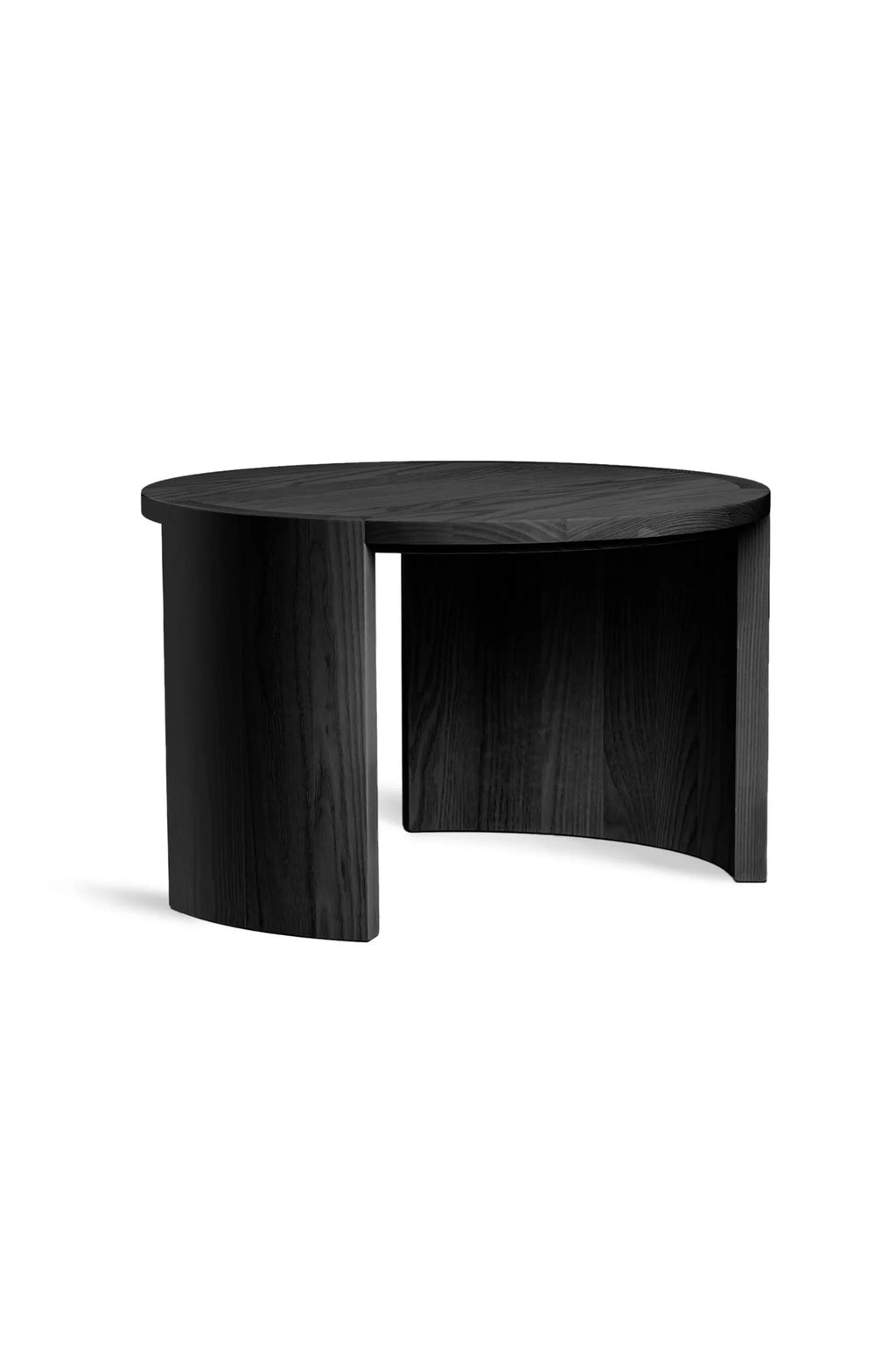 Made by Choice Airisto Coffee Table in black, a sleek and modern round table with a distinctive curved base, crafted from dark wood with a visible grain, presented against a clean white background.