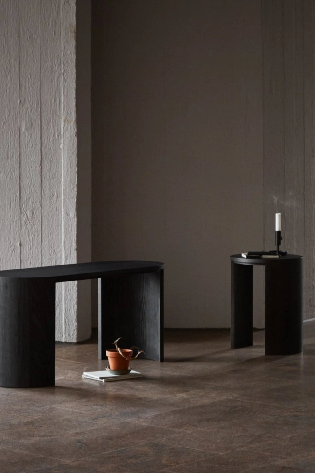 Made by Choice Airisto Side Table, a modern minimalist round side table crafted from black stained ash wood with a visible grain and a smooth, matte finish.