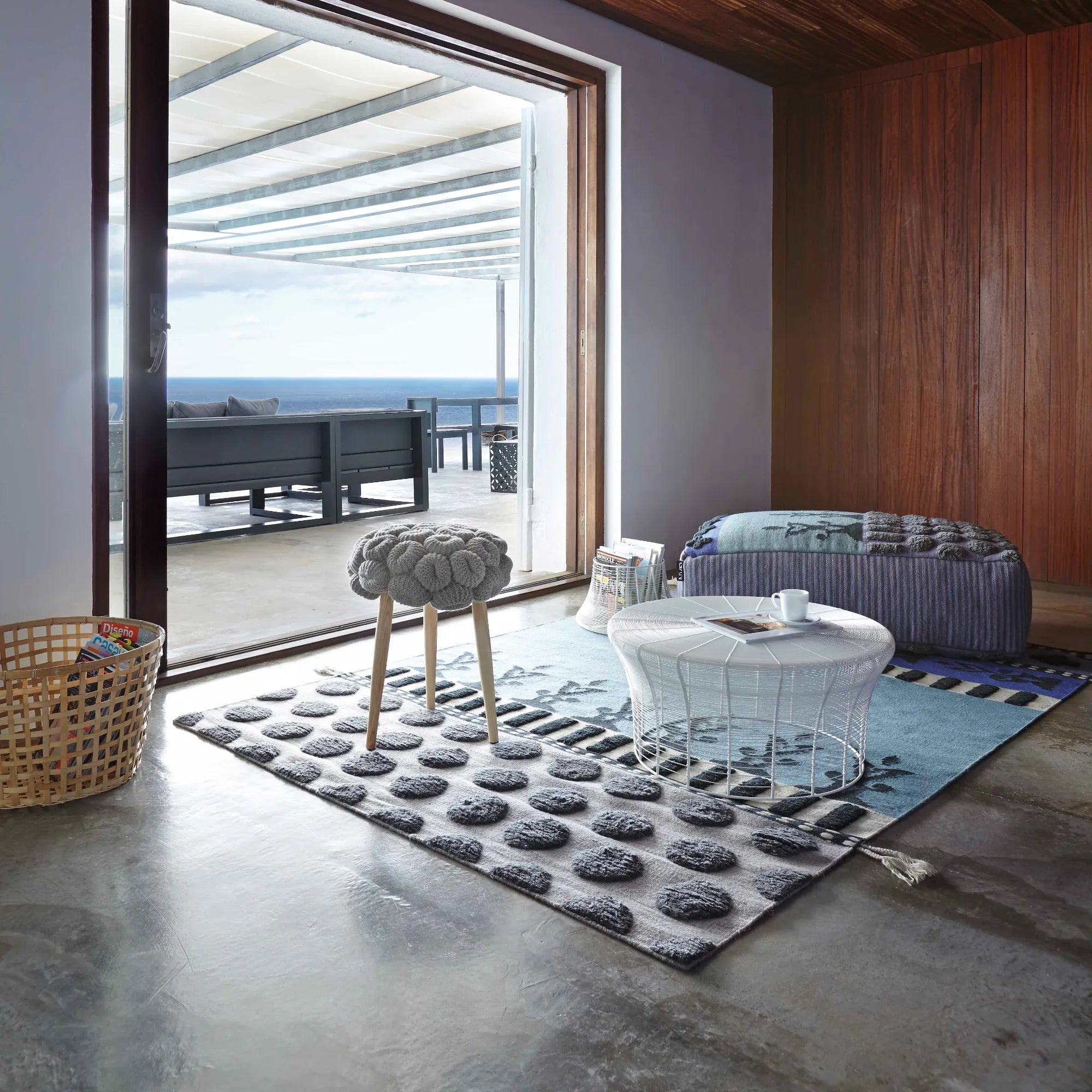 Handmade knitted stool with soft texture and round shape