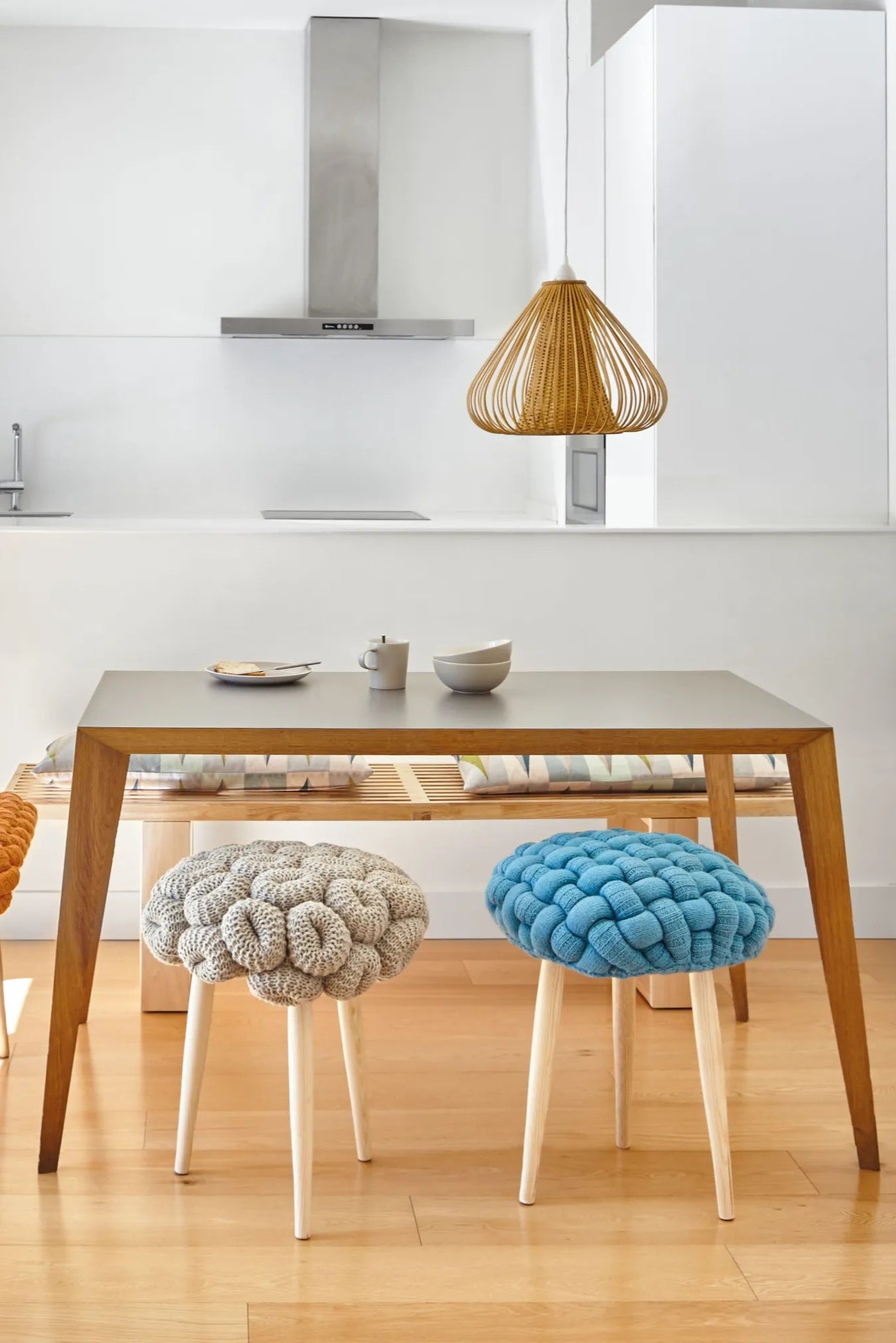 Handcrafted knitted stool made from natural materials in earthy tones