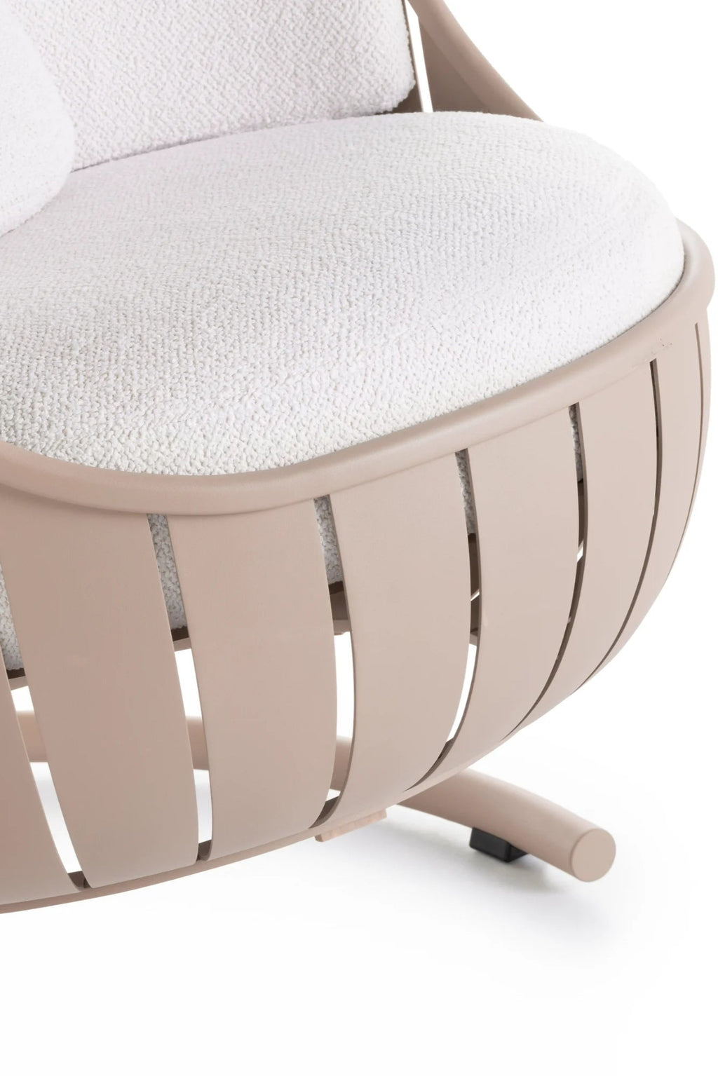 Gandia Blasco Arena Outdoor Swing, a modern outdoor swing featuring a curved, slatted powder-coated aluminum frame in a warm sand beige color. It features a plush, round seat cushion upholstered in a textured, cream-colored bouclé outdoor fabric. Ideal for contemporary patio designs, luxury outdoor living spaces, or minimalist garden retreats.