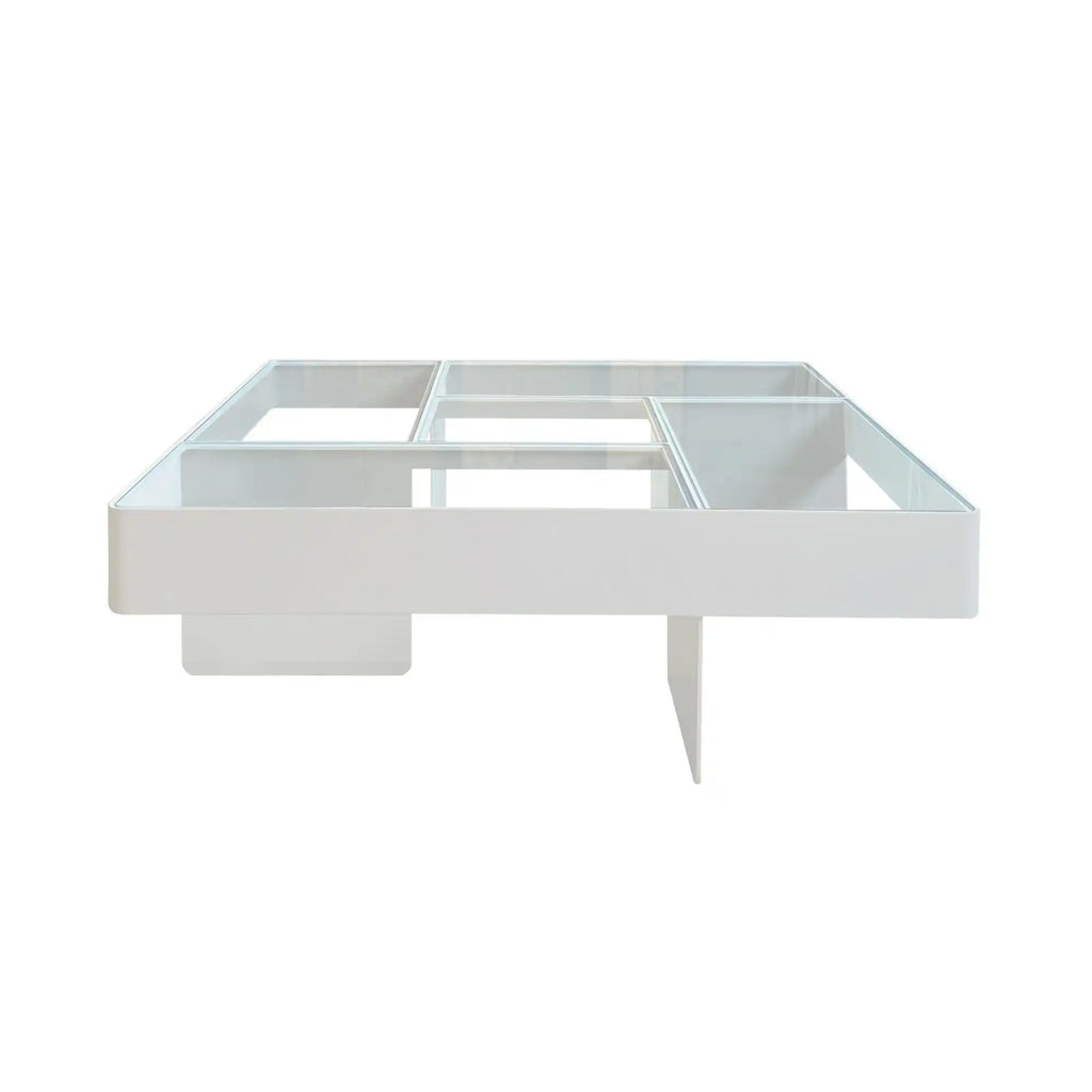 Around Works Blok Low Table, a modern minimalist coffee table featuring a crisp white lacquered wood frame with rounded corners and a clear glass top. Its geometric design includes internal glass dividers, creating multiple compartments for display and storage. Perfect for contemporary living rooms and minimalist interiors.