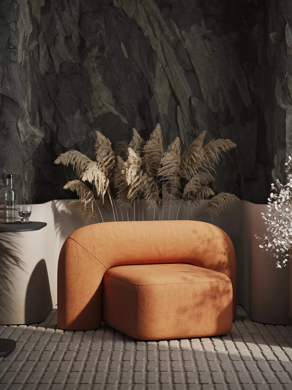ARTU Moss Lounge Chair, a striking organic modern lounge chair upholstered in a rich burnt orange textured fabric, showcasing a distinctive sculptural, armless silhouette with a gracefully curved back and deep, plush seating.