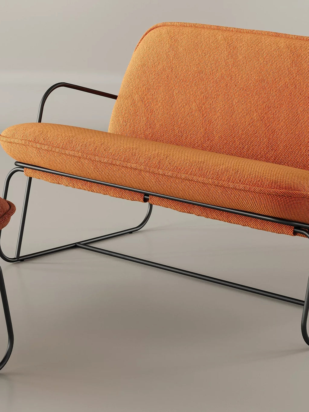 ARTU Tuttu Monteur Sofa, a vibrant burnt orange fabric 2-seater sofa featuring a distinctive matte black tubular metal frame with integrated armrests and a sleek, modern silhouette. This contemporary sofa offers plush, comfortable seating with a durable woven textile upholstery, ideal for mid-century modern living rooms, industrial chic apartments, or stylish lounge areas.