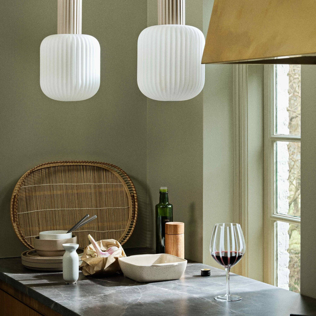 Broste Copenhagen Oak Grinder, a sleek cylindrical spice grinder crafted from natural light oak wood with a smooth, minimalist design and visible wood grain. This modern oak pepper grinder is perfect for Scandinavian kitchen decor, contemporary dining table settings, or as a stylish home accessory.