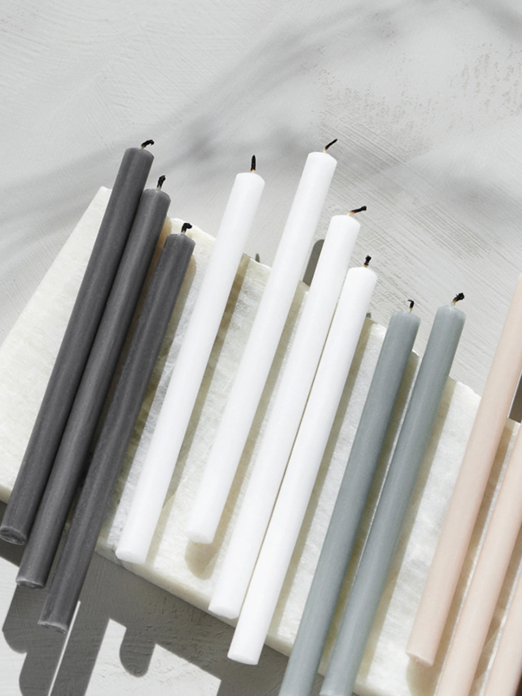 Decorative stoff nagel candles with different colors, set of 8.
