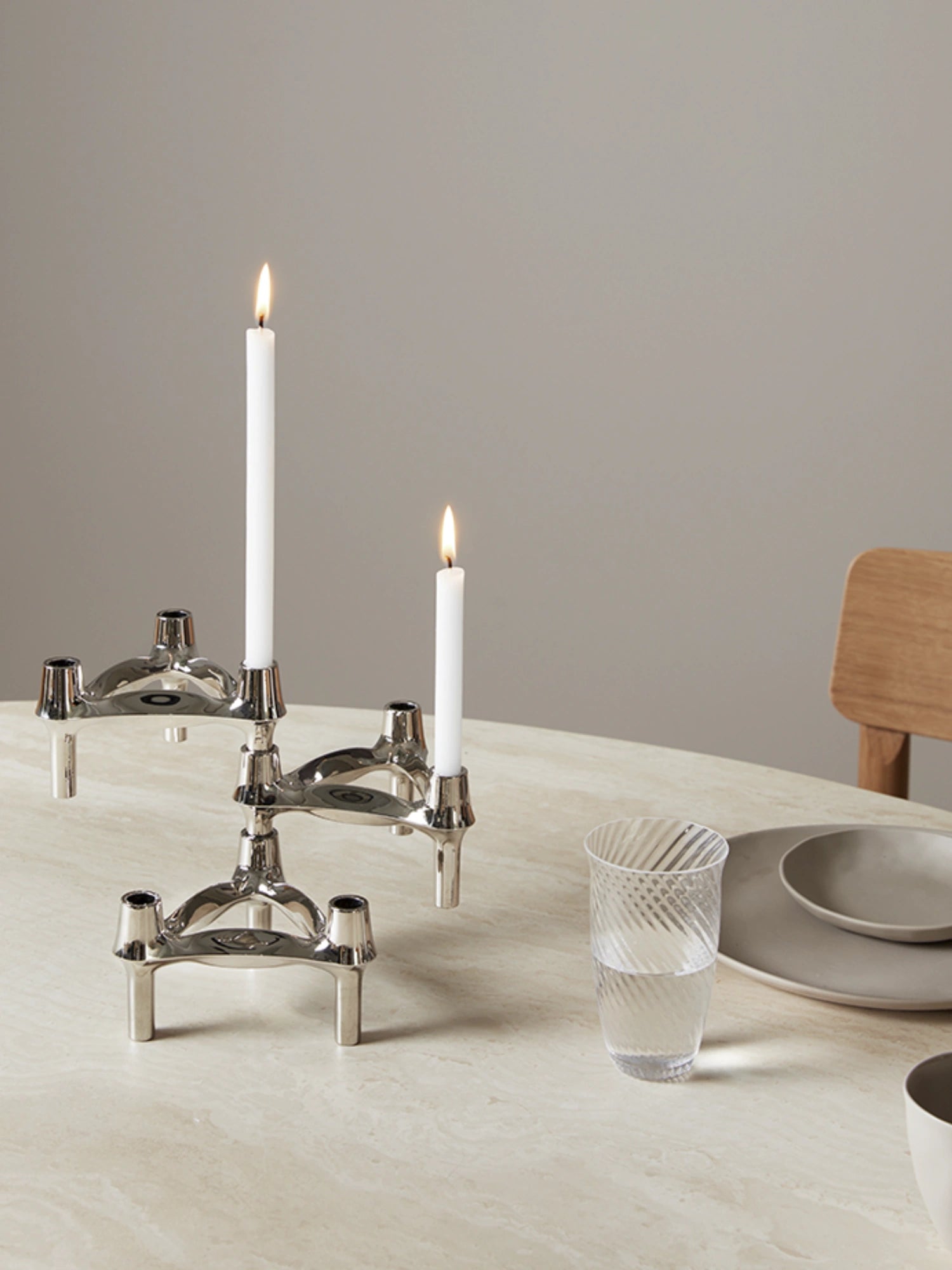 Stoff Nagel Candles - Set of 12, a collection of tall, elegant white taper candles crafted from smooth wax, perfectly designed to fit the iconic Stoff Nagel modular candle holders. These minimalist and Scandinavian-inspired candles are ideal for creating a warm ambiance on dining tables, living room consoles, or entryway displays.