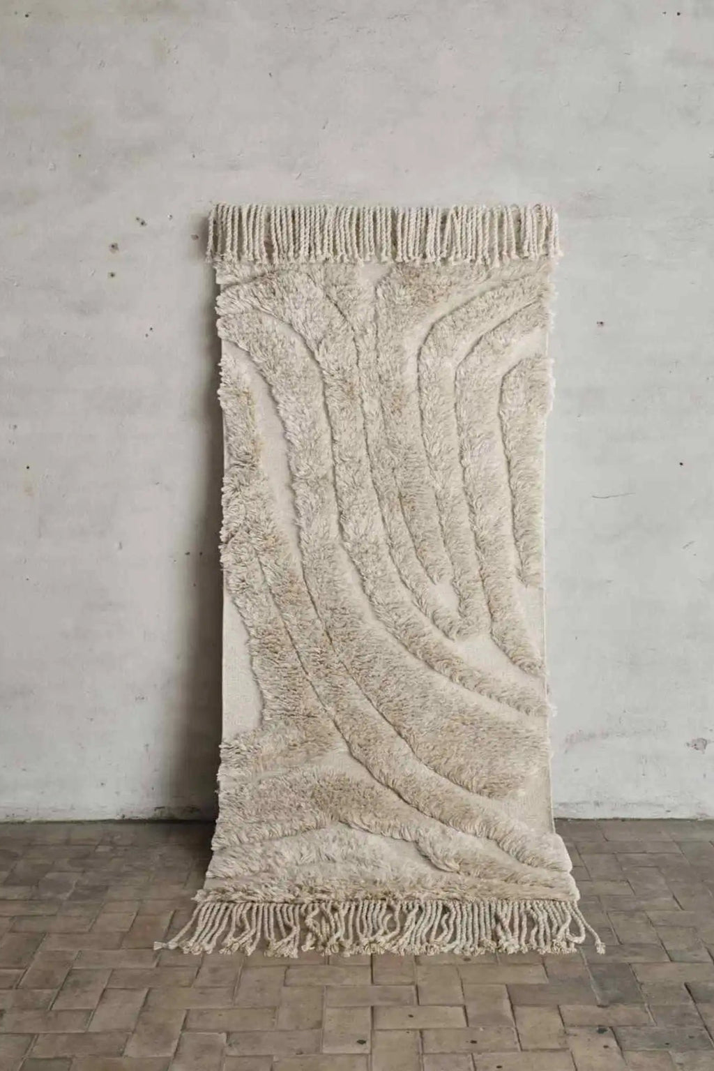 Cappelen Dimyr Colonnade No.04 Rug, a premium hand-knotted wool area rug featuring a plush high pile and shaggy texture in natural undyed cream and beige tones.