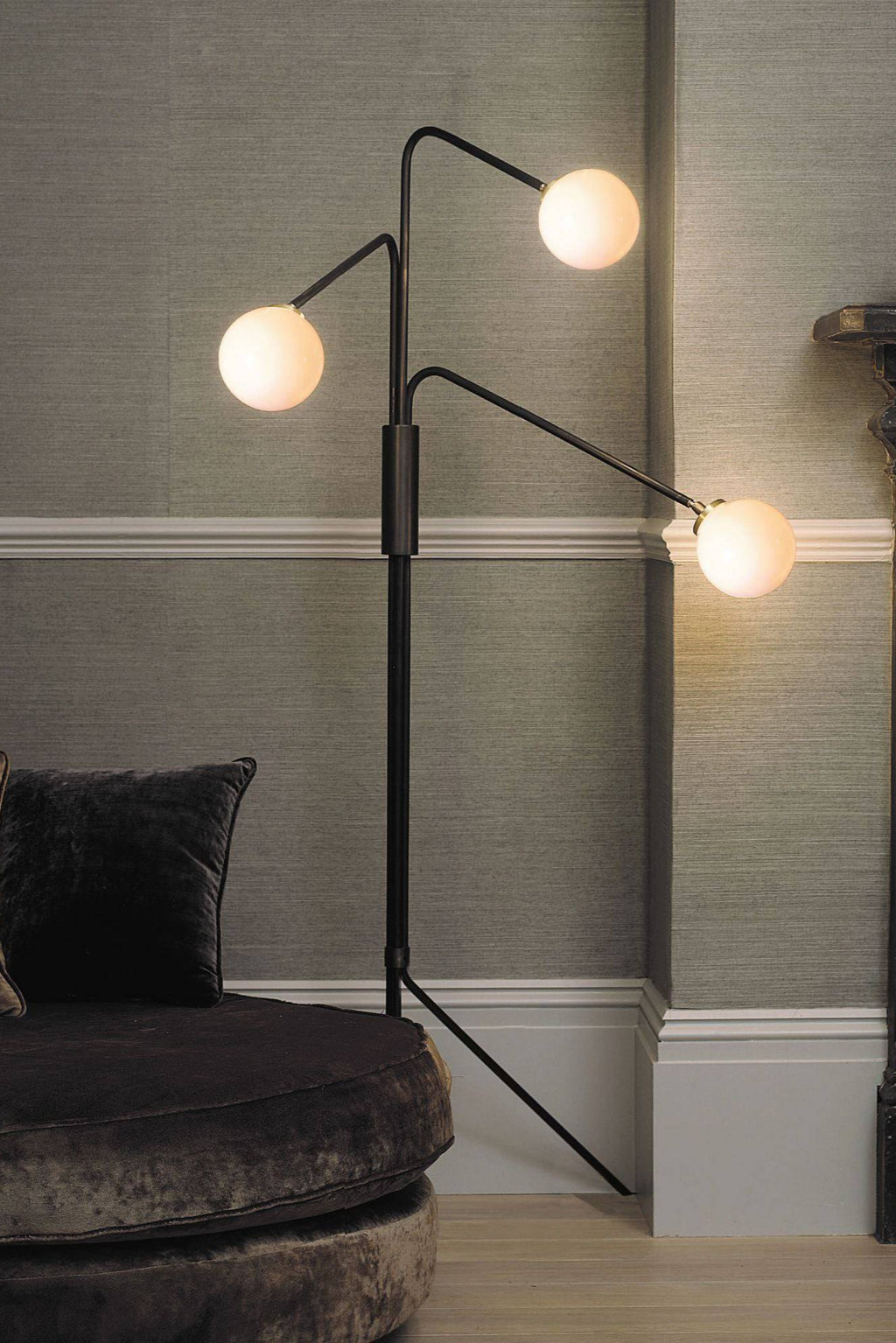 CTO Lighting Array Opal Floor Lamp, a striking modern floor lamp featuring a matte black metal frame with a sculptural multi-arm design, each tipped with a luminous spherical opal glass diffuser. This contemporary designer floor lamp provides elegant ambient lighting, perfect for a minimalist living room or sophisticated bedroom accent.