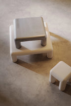 Two Formarkivet coffee tables and sidetable on a concrete floor
