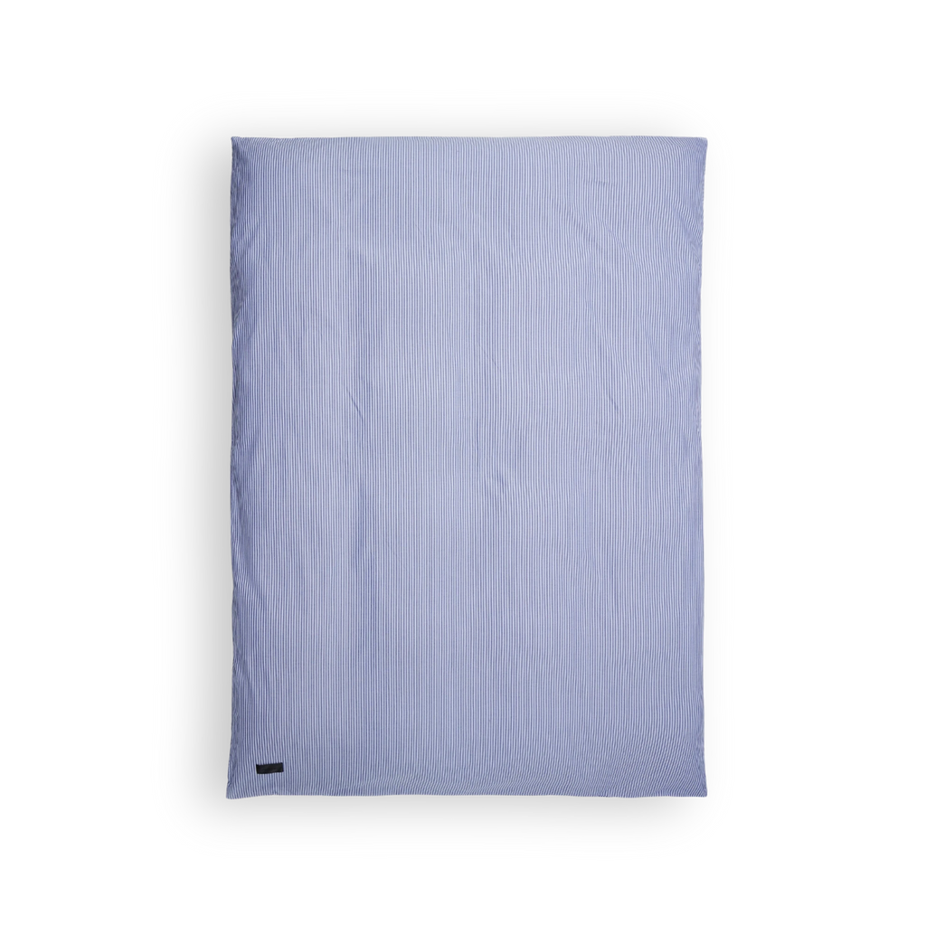 Magniberg Wall Street Duvet Cover - Stripe Dark Blue Oxford, a luxurious Oxford cotton duvet cover featuring a classic dark blue and crisp white fine vertical stripe pattern, offering a soft, breathable texture and a refined.