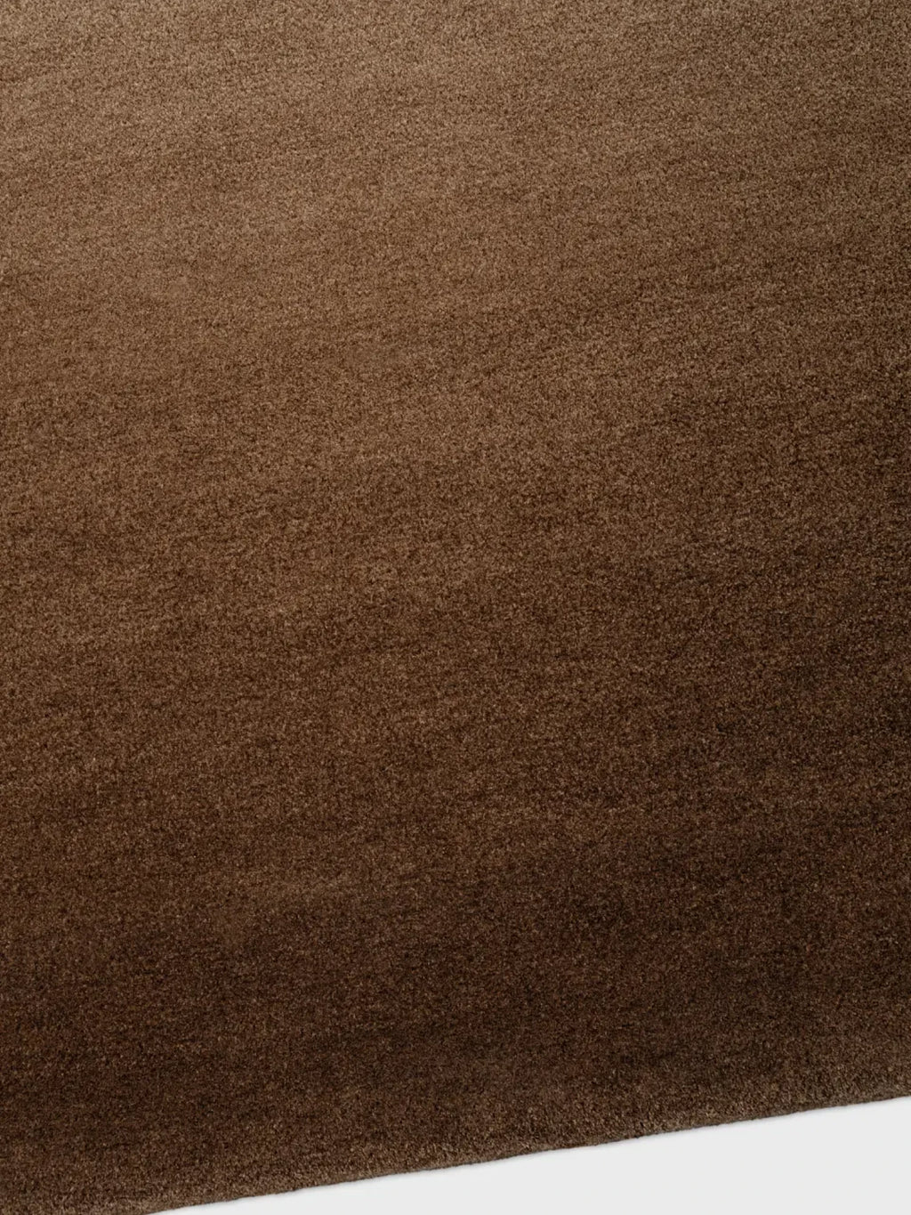 alp_ Degradé Simple Rug, a luxurious modern brown area rug featuring a subtle degradé effect that transitions from lighter to darker chocolate brown tones, with a plush, soft short pile texture.