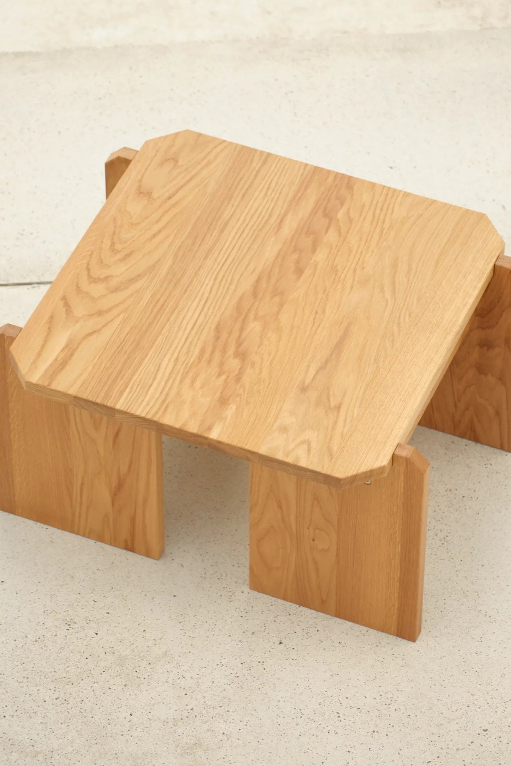  Close up of stamp detail on the wooden surface of the coffee table