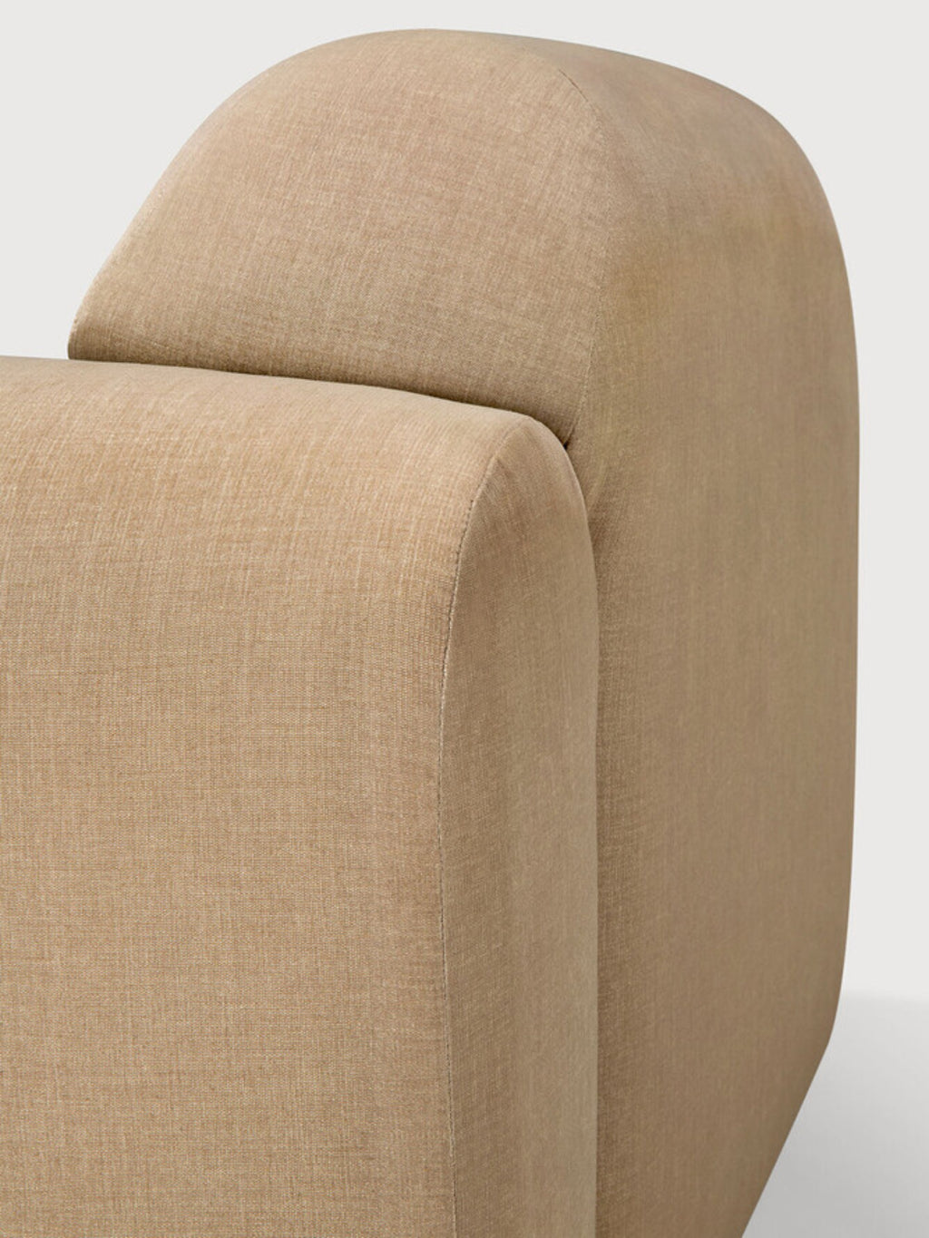 Ethnicraft Bulky Modular Sofa detail, a close-up of the backrest's gentle curve and the robust, yet soft, beige textile, emphasizing the sofa's premium craftsmanship.