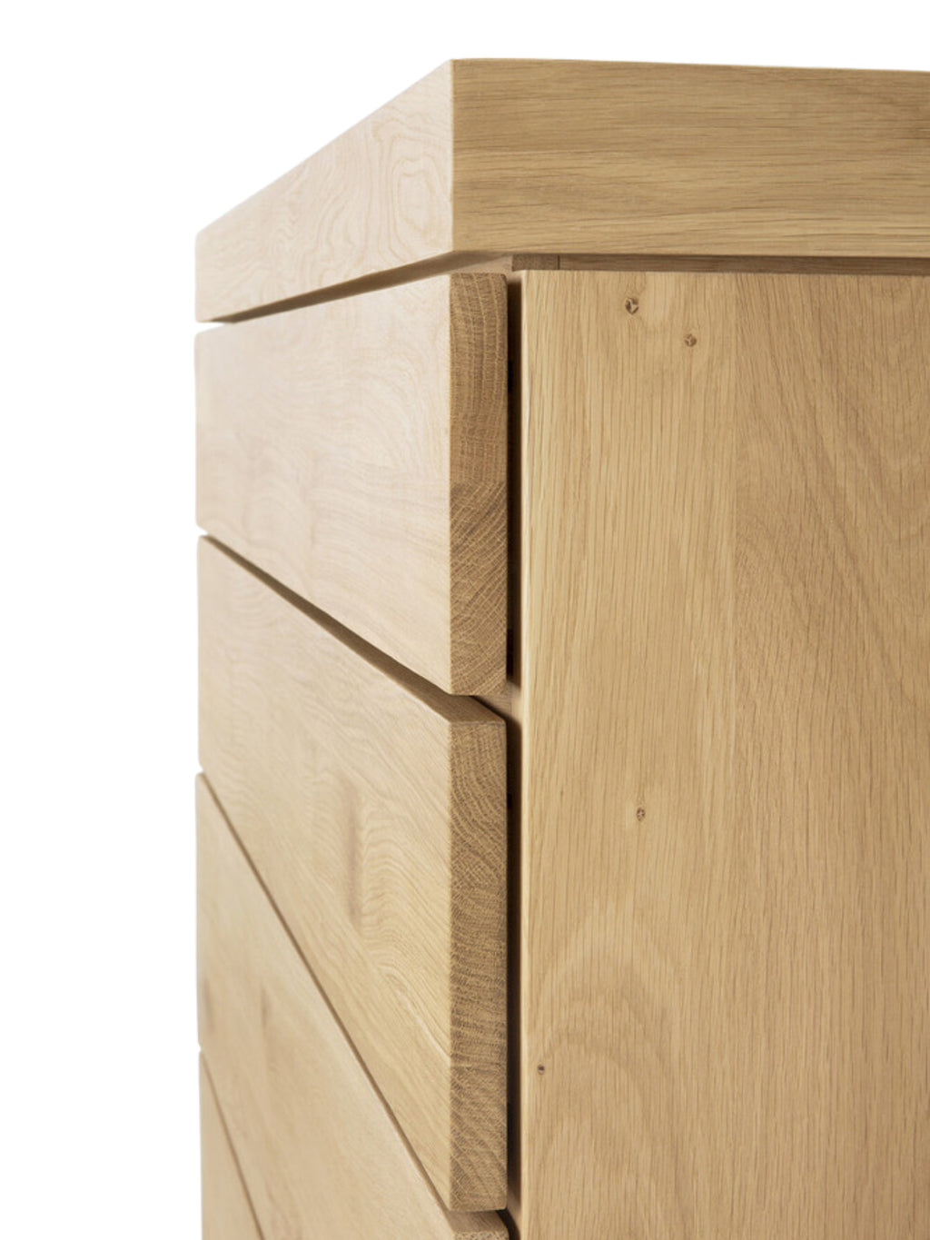 Ethnicraft Burger Dresser in Oak, a detailed side view showcasing the stacked, clean lines of the light natural oak wood drawers, highlighting the minimalist and robust construction.