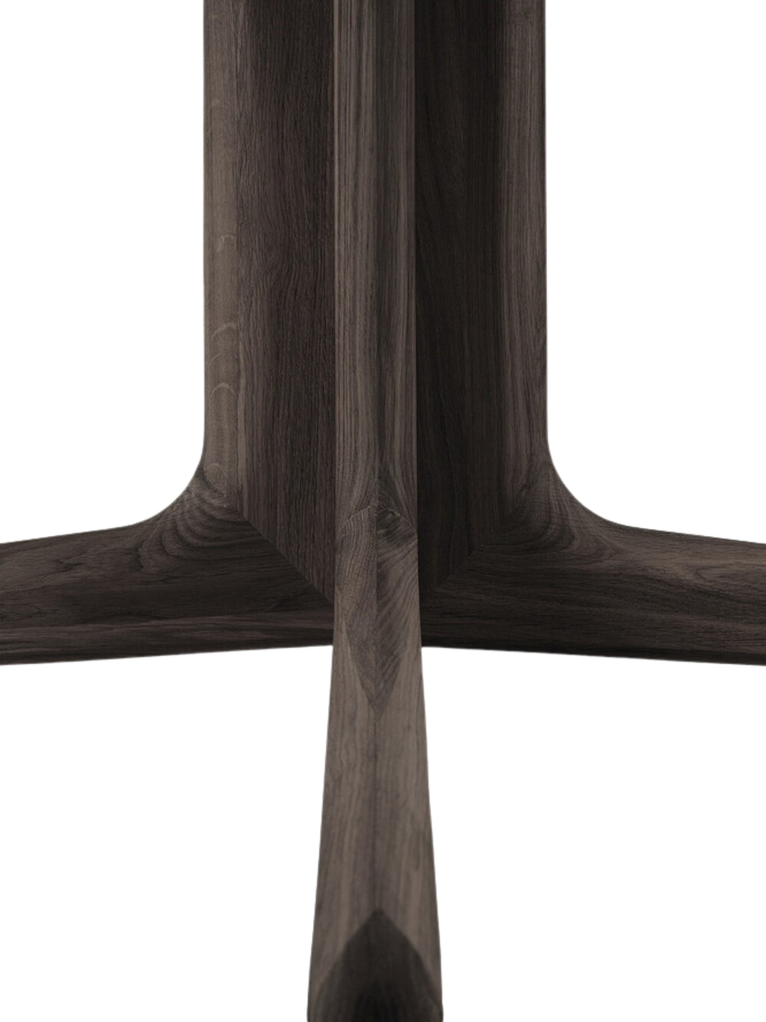 Ethnicraft Corto Dining Table base detail, highlighting the intricate joinery and sculptural form of the dark brown oak pedestal legs, showcasing expert craftsmanship and stability.