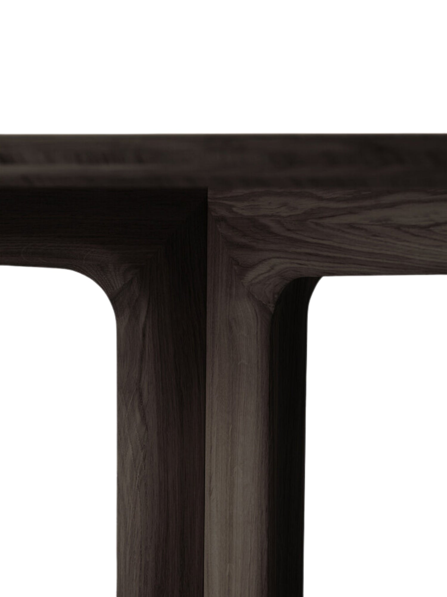 Ethnicraft Corto Dining Table detail, showing the unique curved joint where the dark brown oak tabletop meets the pedestal, emphasizing the table's sophisticated and fluid design.
