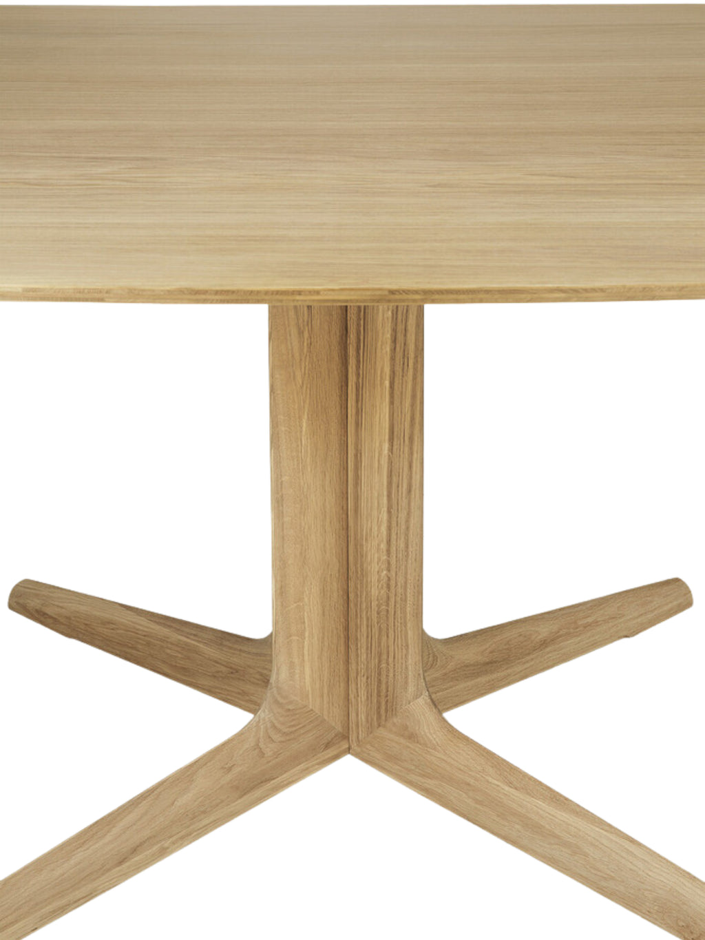 Ethnicraft Corto Dining Table, a close-up detail of the square oak tabletop and the robust, intricately designed pedestal base, highlighting the natural wood texture.