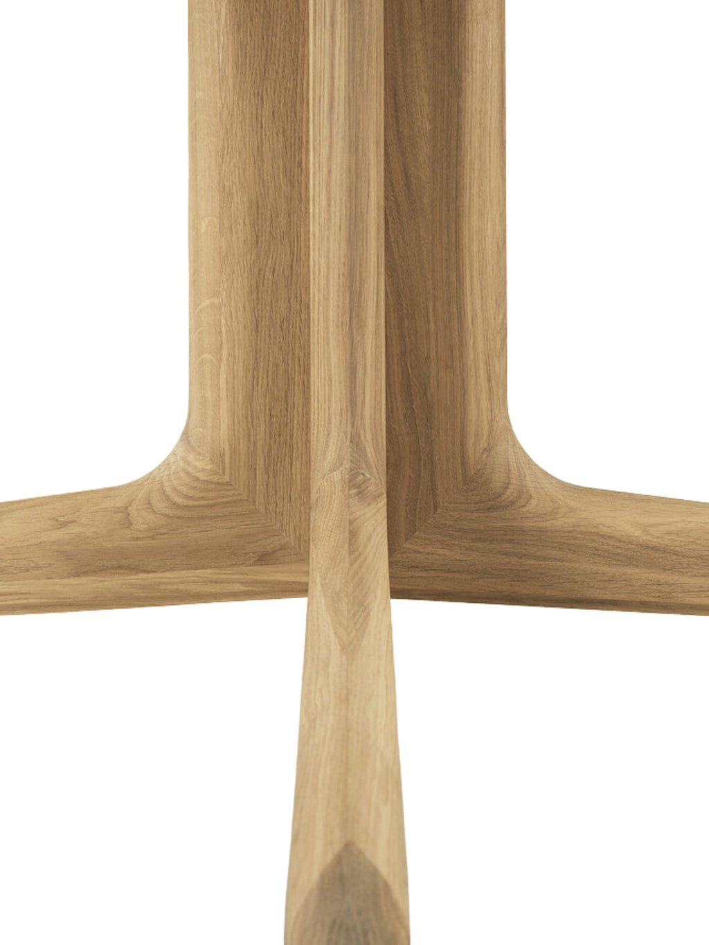 Ethnicraft Corto Dining Table, a detailed shot of the square oak table's sturdy, sculpted pedestal base, revealing the intricate joinery and beautiful wood grain.
