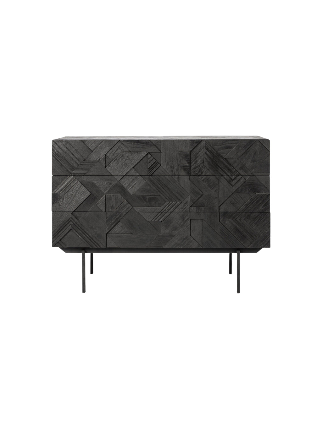 Ethnicraft Graphic Dresser, a modern black teak wood dresser with a distinctive geometric carved pattern across its three drawers. The elegant design sits on slender black metal legs, presented on a crisp white background.