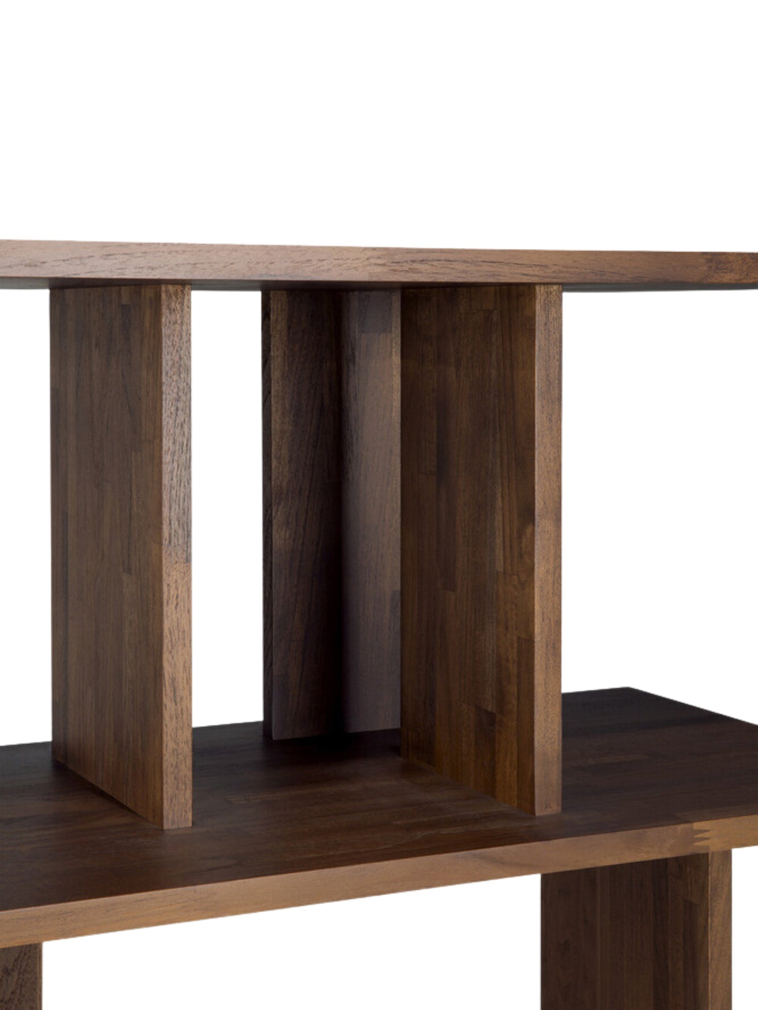 Ethnicraft Irregular Rack, a close-up detail shot showcasing the rich, warm brown tones and intricate wood grain of the solid teak material, highlighting the unique, modern design with its varied shelf heights and depths, displayed on a clean white background.